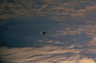 Illustration for article titled Did NASA delete evidence of UFOs from its photo archive?